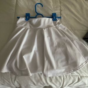 White tennis skirt with shorts underneath no stains etc